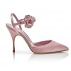 Manolo Blahnik satin flower pumps $1,025.